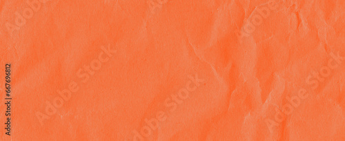 Recycled crumpled orange paper texture background. Royalty high-quality free stock photo image of Wrinkled and creased abstract backdrop, wallpaper with copy space, top view