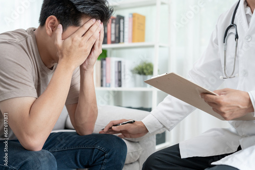 psychiatrist holds feel worried while discussing life and family issues. doctor encourages and empathy woman suffers depression. psychological  save divorce  Hand in hand together  trust