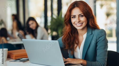 Smiling Adult Latino Woman with Red Straight Hair Photo. Portrait of Business Person in the office in front of laptop. Photorealistic Ai Generated Horizontal Illustration.