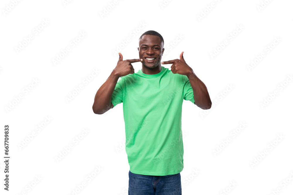 young positive 30 year old American guy dressed casually in a basic t-shirt and jeans young positive 30 year old American guy dressed casually in a basic t-shirt and jeans