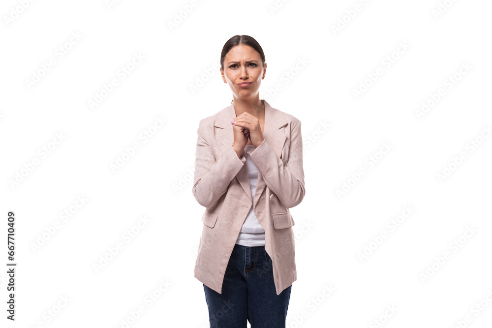 portrait of a young slender brunette business woman with ponytail dressed in a jacket and jeans portrait of a young slender brunette business woman with ponytail dressed in a jacket and jeans