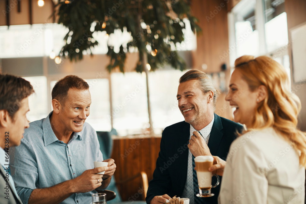 Business people having a meeting in a cafe Business people having a meeting in a cafe