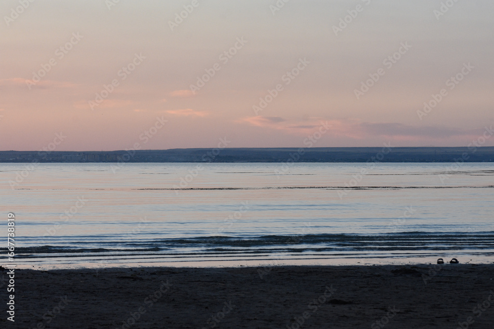 water in the lake in sunset light, horizon. water in the lake in sunset light, horizon.