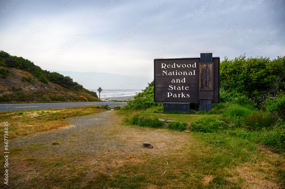 Welcome sign at the entrance to Redwood National Park near Freshwater Lagoon in California, USA