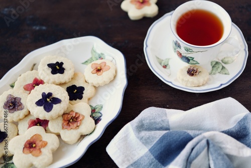 homemade cozy cookies with edible flowers violets