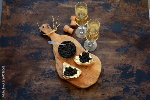 black caviar and champagne still life
