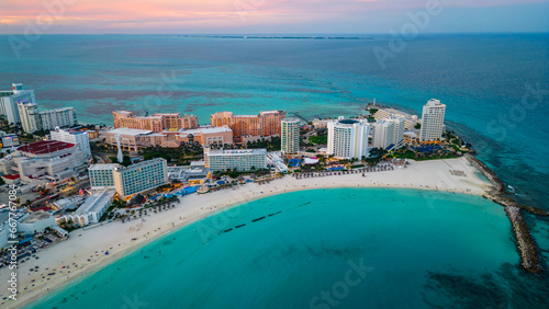 Cancun Mexico aerial at sunset of Caribbean Sea ocean resort tropical beach  photo