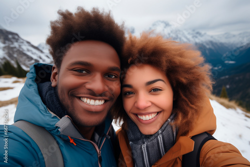 multiracial couple poses for a selfie photo. asian and american background, mountain © Enrique