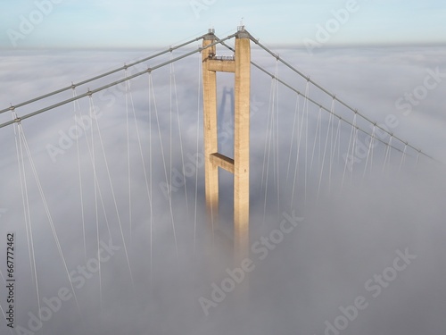 aerial view of the Humber Bridge in the morning mist over the river humber  © burnstuff2003
