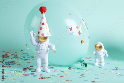 confetti and a cosmonaut couple exploring a new planet