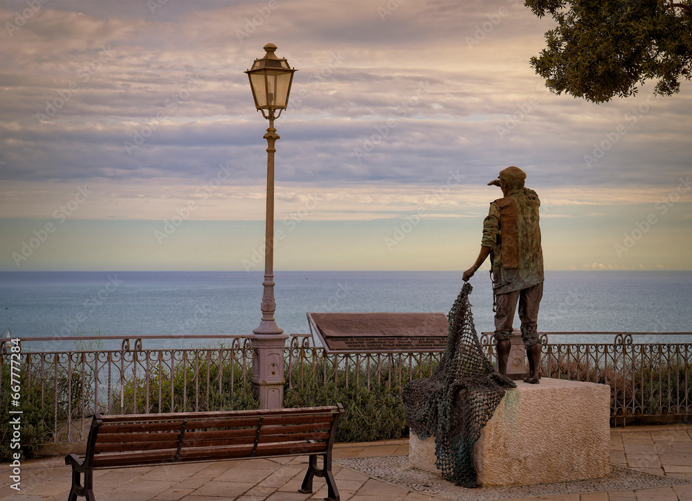 Fototapeta premium statue of a fisherman, Numana, Marche, Italy
