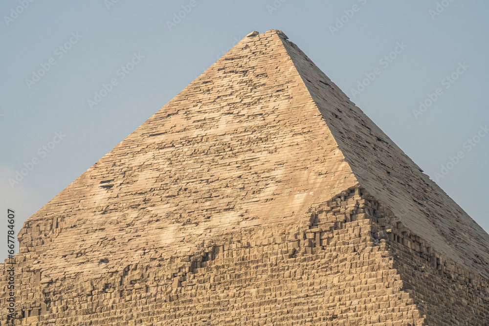 Top of the Giza pyramids during a sunny day, copy space, sand