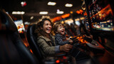 Mother and son playing video games in amusement park. Concept of leisure activity.