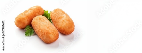homemade breaded croquettes isolated on white photo