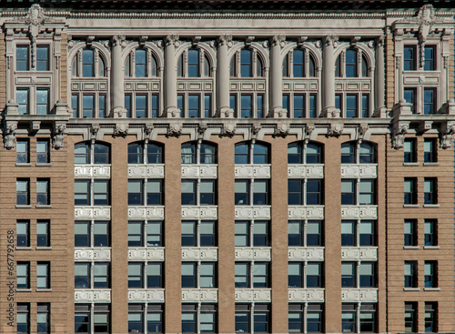 tall historic building in downtown Binghamton, NY detail (ten floor life insurance landmark skyscraper) security, 10 stories, mutual, windows, small town (court street, chenango) southern tier broome