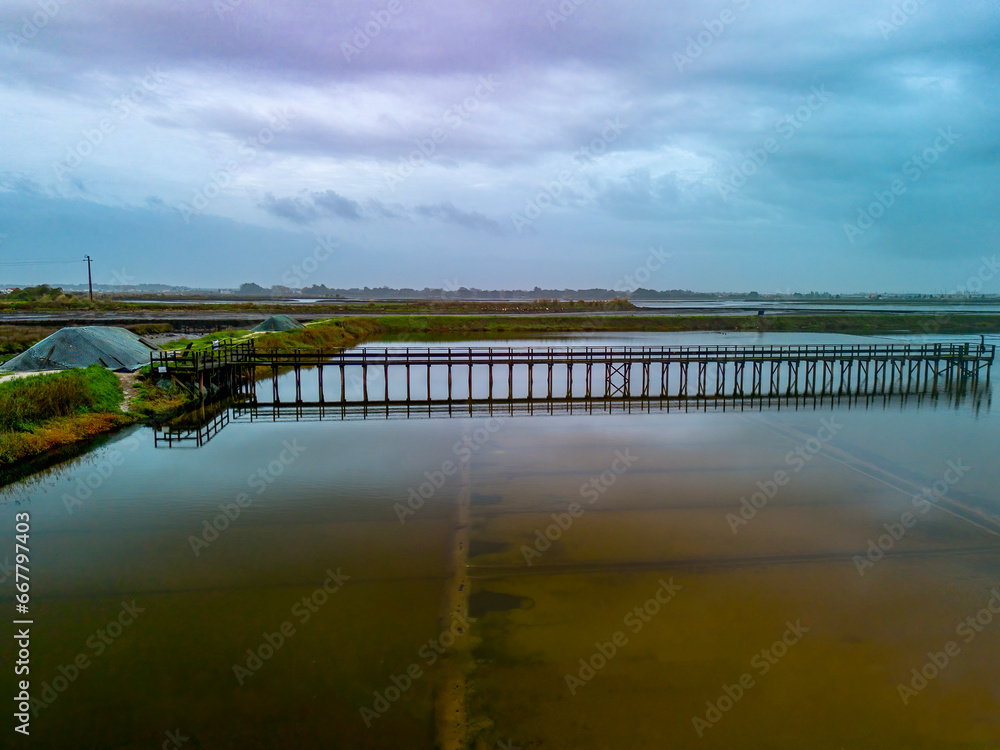 Pier at the sea salt production salt mines in Ria de Aveiro