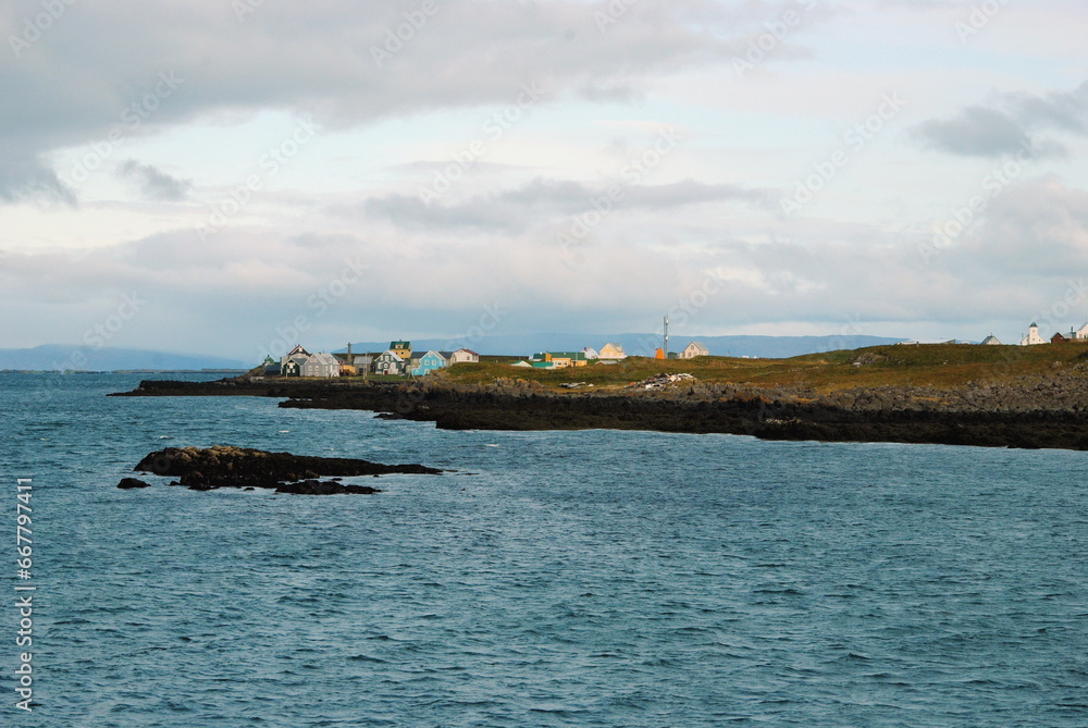 View on Flatey island in Breidafjördur fjord, Westfjords, Iceland from the ferry Baldur 