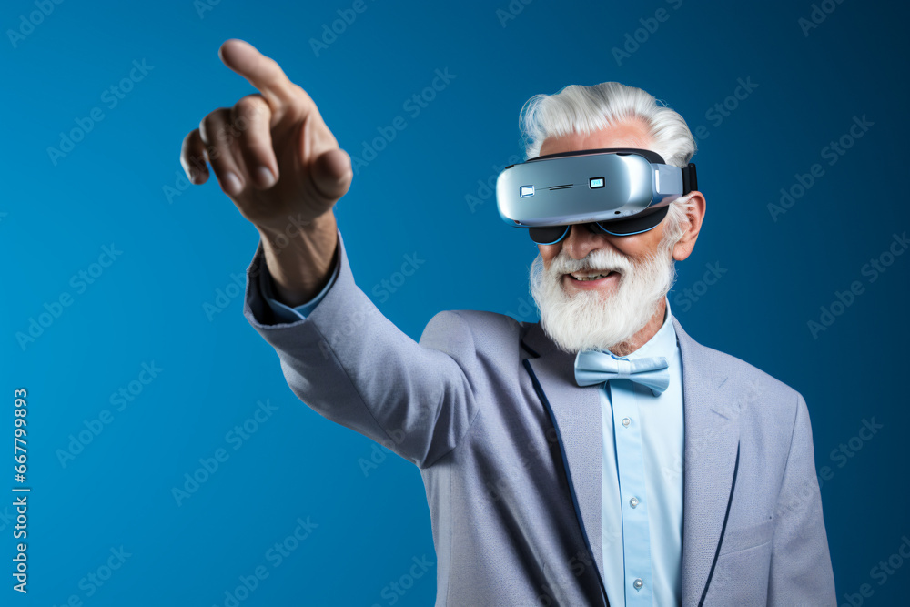 Senior man in suit and modern augmented reality headset interacting with virtual content on plain blue background. Advertising image with bright colors and high-impact volumetric lighting. Senior man in suit and modern augmented reality headset interacting with virtual content on plain blue background. Advertising image with bright colors and high-impact volumetric lighting.