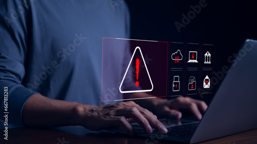 Cyber security warning alert system concept. Businessman working on laptop. Computer network hack, crime and virus, Malicious software, compromised information, illegal connection, data vulnerability, photo