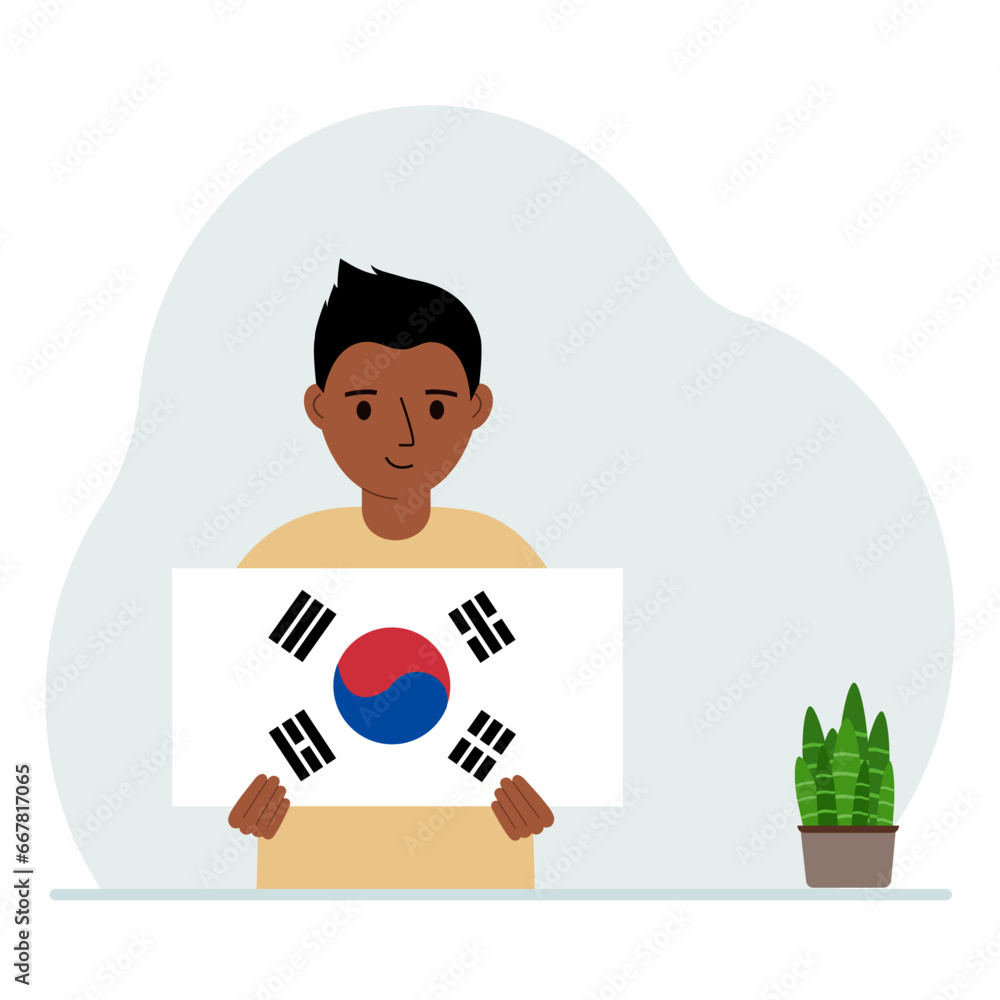 A little boy is holding the flag of South Korea. The concept of demonstration, national holiday, independence day or patriotism. Nationality. A little boy is holding the flag of South Korea. The concept of demonstration, national holiday, independence day or patriotism. Nationality.