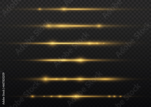 Yellow horizontal lens flares pack. Laser beams, horizontal light rays. Beautiful light flares. Glowing streaks on dark background. Luminous abstract sparkling lined background.