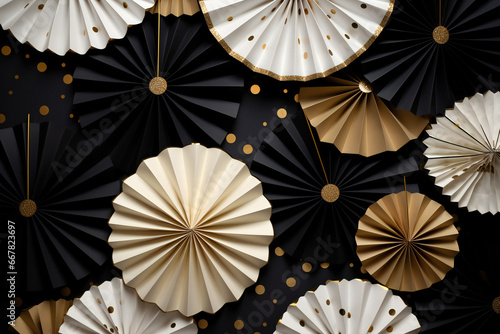 Christmas festive greeting background: gold black and white paper fans pattern with round confetti on a black background