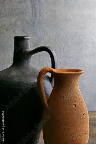 old used empty clay jugs. Still life photography with vintage objects