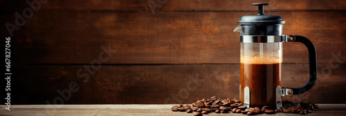 Fotografia French press with freshly brewed coffee background with empty space for text