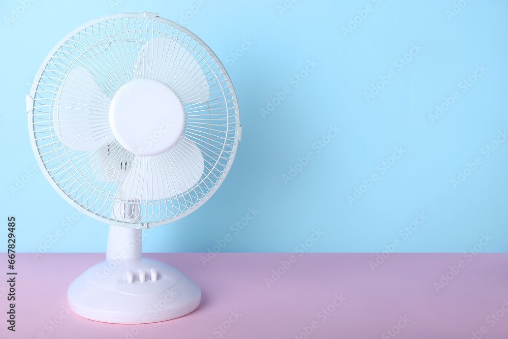 Electric fan on blue background Electric fan on blue background