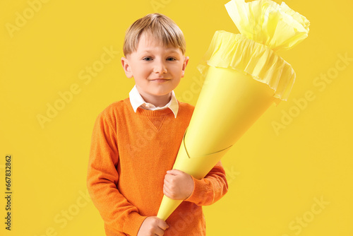 Happy little boy with schoo...