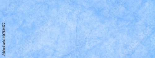 Blue grunge marble textured watercolor background, polished and smooth wash blue watercolor paper texture, blue grunge texture with center in the blank, blue background with light marble texture.