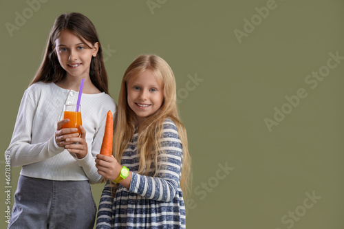 Little girls with glass of ...