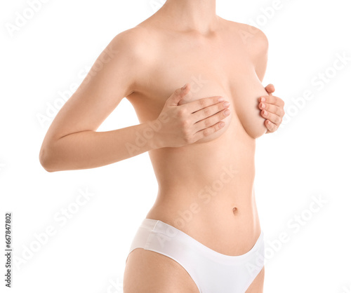 Young woman covering her br...