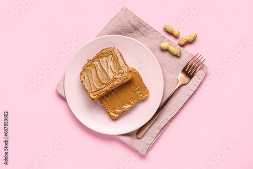 Peanut butter toast on pink...