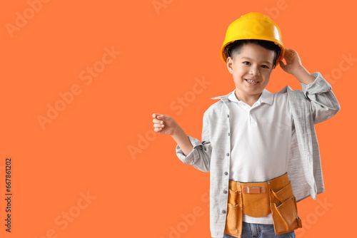 Cute little worker in hardh...
