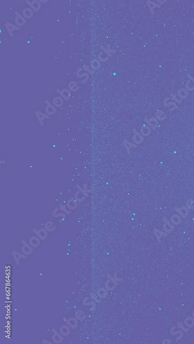 Blue tiny dots glitter on very peri purple background that formed in the right and spreads throughout the frame. Vertical abstract stars backdrop party or Christmas holidays concept with copy space