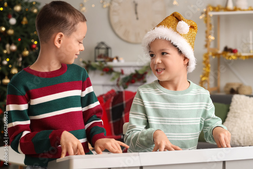 Cute little boys playing sy...