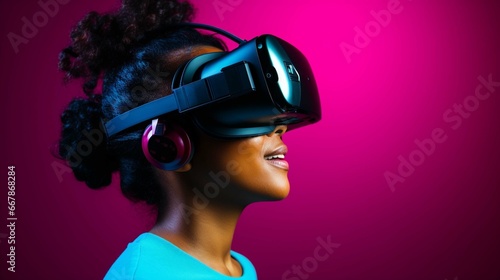 young dark-skinned african woman wearing new revolutionary gaming technology - virtual or augmented reality glasses, studio portrait on neon magenta © Ahtesham