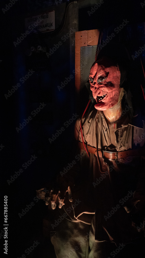 Spooky Halloween Costume in a haunted house Spooky Halloween Costume in a haunted house