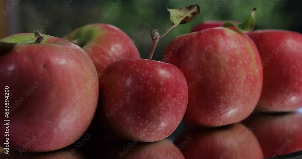 Red apples close up turning on mirror Red apples close up turning on mirror