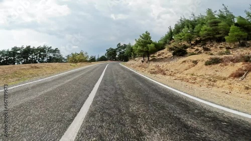 Road trip by car along the mountain roads and serpentines on sanset of Turkey. photo