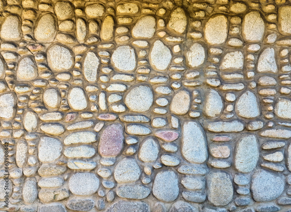 rock wall of natural river stones rock wall of natural river stones