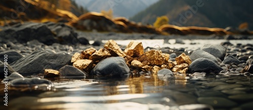 Real gold mined from Austrian river photo