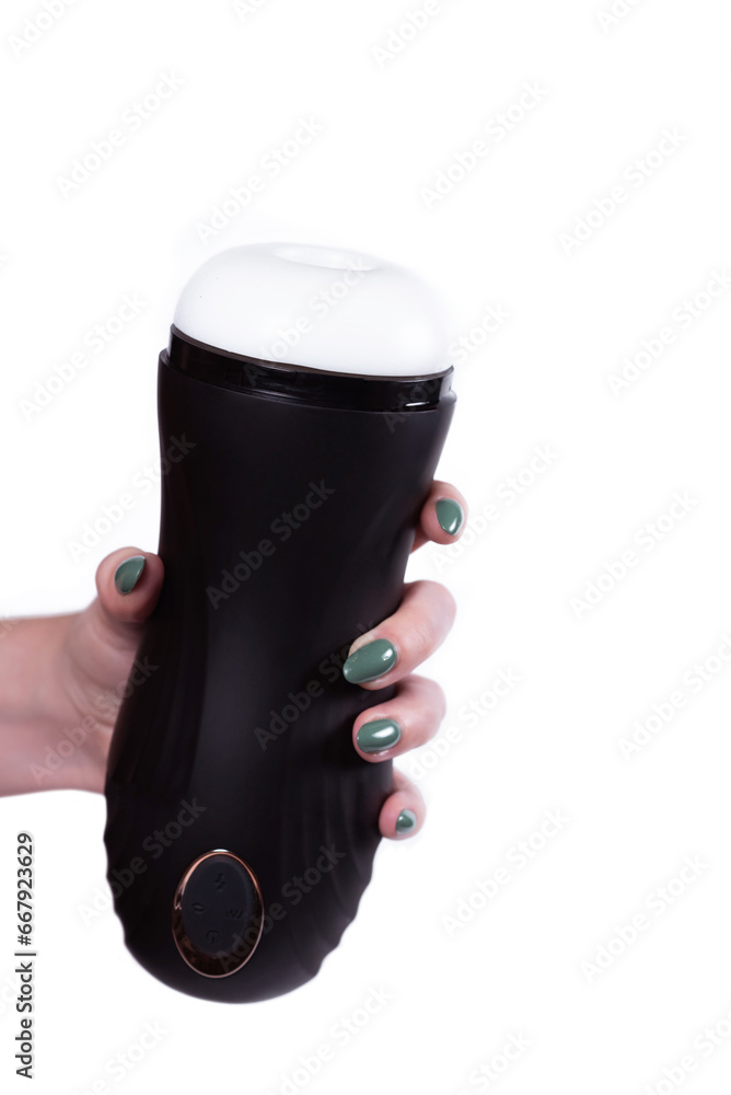 Sex toys for men. An artificial vagina for masturbation in the hands of a girl on a white background. Male massager. Sex shop Adult store Sex toys for men. An artificial vagina for masturbation in the hands of a girl on a white background. Male massager. Sex shop Adult store