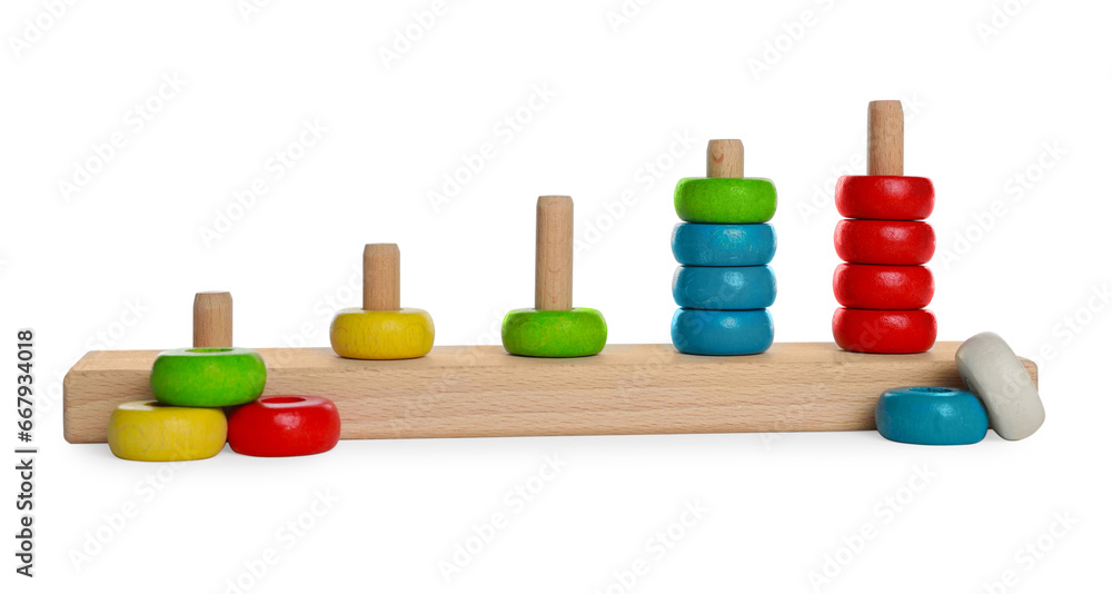 Stacking and counting game wooden pieces isolated on white. Educational toy for motor skills development Stacking and counting game wooden pieces isolated on white. Educational toy for motor skills development