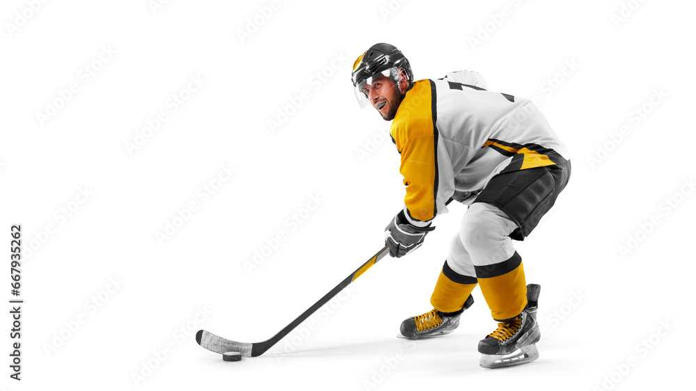 Obraz premium Athlete in action. Sports emotions. Hockey. Professional hockey player in the helmet and gloves on white background. Hockey concept