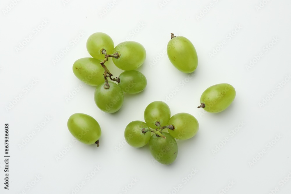 Fresh grapes on white background, top view Fresh grapes on white background, top view