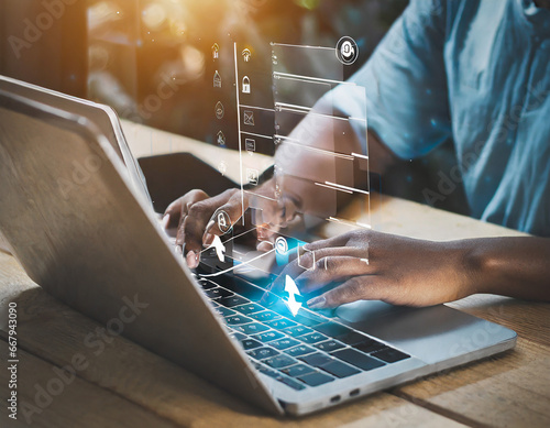 User use a laptop computer to download and update software with waiting to load digital file data from the website, and very slow internet from wifi. Concept of waiting for a load of loading symbol