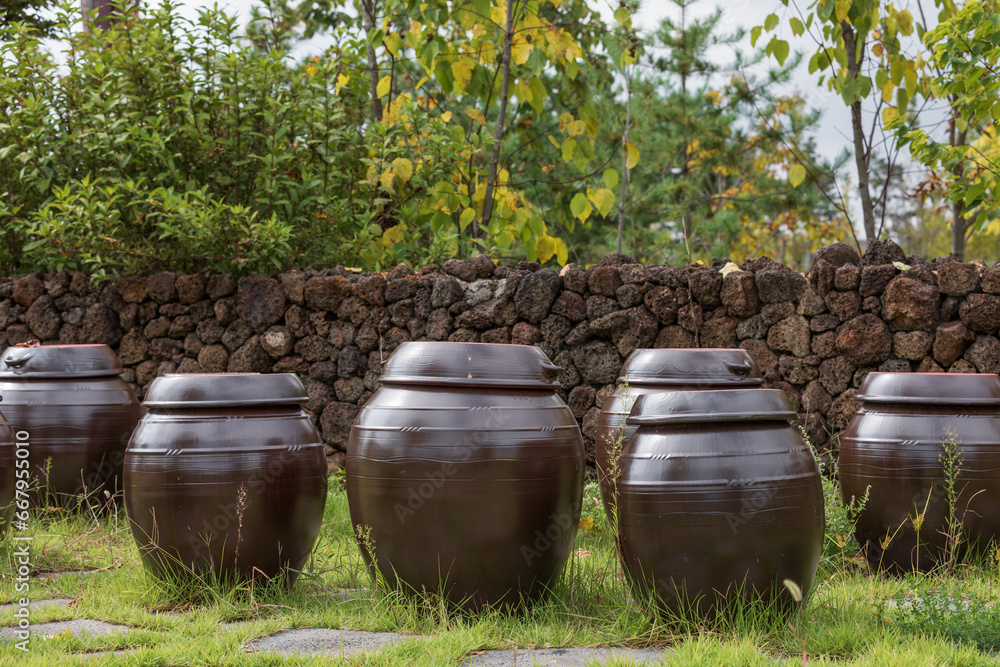 Brown jars placed in the yard. Jangdokdae Brown jars placed in the yard. Jangdokdae