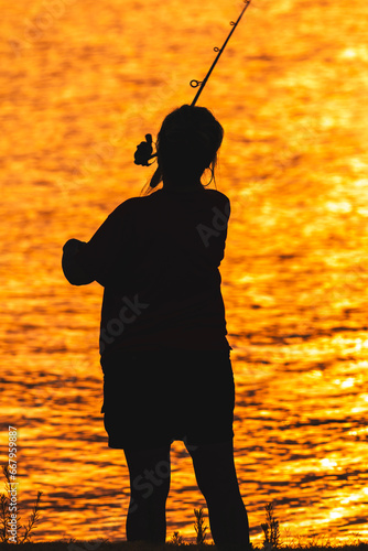 Woman fishing at Lake Texoma, Oklahoma
